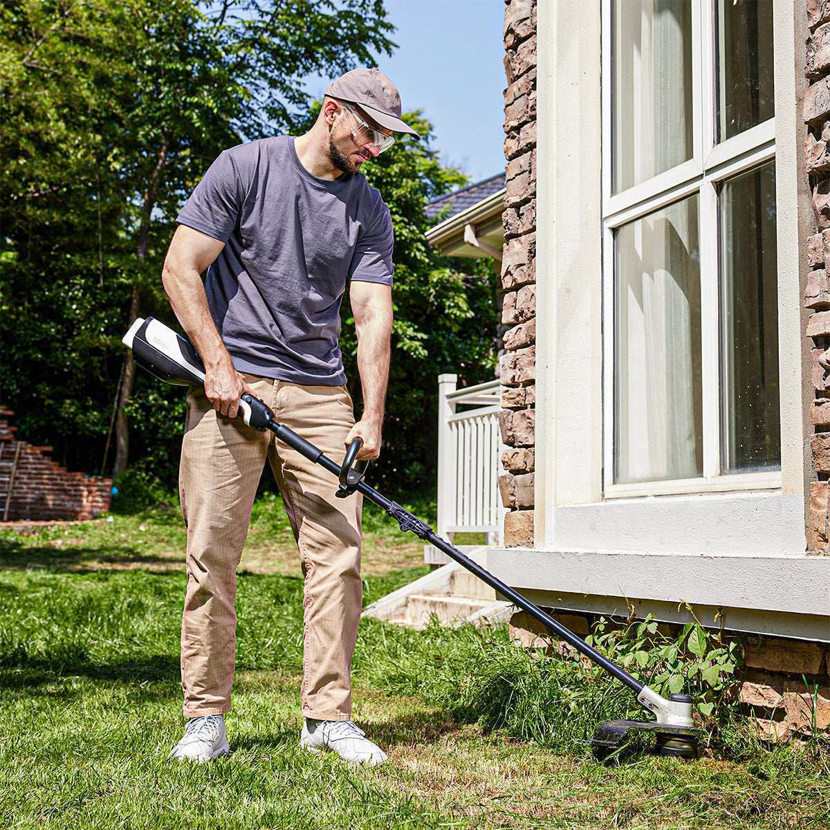 Dual-speed cordless string trimmer adjusts power or runtime for efficient yard trimming