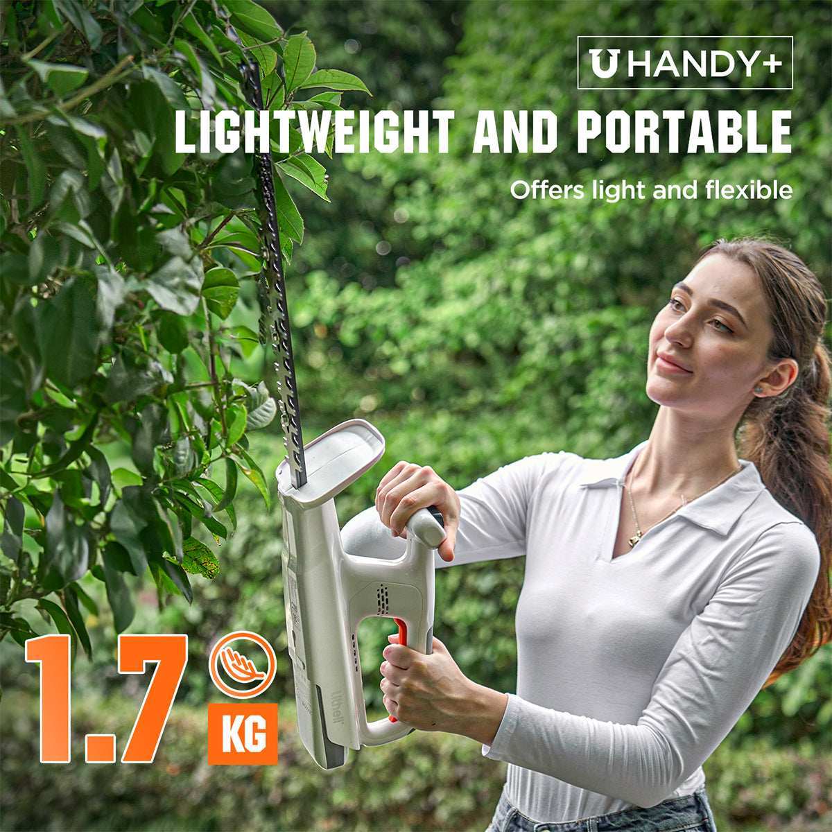DIY enthusiast using Handy+ hedge trimmer for precise garden hedge shaping