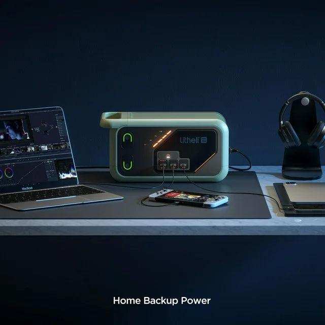 Portable battery station charging multiple devices at campsite or picnic